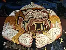 Image 42Mural painting of the epic Ramakien depicts the Hanuman enlarging his body to rescue Phra Ram. (from Culture of Thailand)