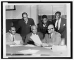 Clarence Mitchell Jr. (seated, bottom left), William Holmes Borders (seated, bottom center), and A.T. Walden (seated, bottom right), 1950.