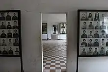 Image 19Rooms of the Tuol Sleng Genocide Museum contain thousands of photos taken by the Khmer Rouge of their victims. (from History of Cambodia)