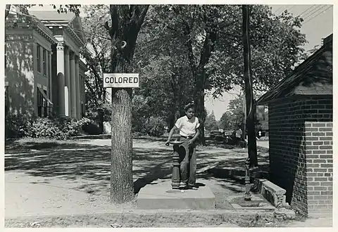 Drinking fountain on the Halifax County Courthouse lawn, April 1938 (Farm Security Administration photograph by John Vachon)