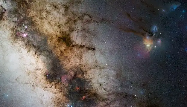 Image 21Milky WayPhotograph credit: ESO / Stéphane GuisardThe Milky Way is the galaxy that contains the Solar System, with the name describing the galaxy's appearance from Earth: a hazy band of light seen in the night sky formed from stars that cannot be individually distinguished by the naked eye. The term Milky Way is a translation of the Latin via lactea, from the Greek γαλαξίας κύκλος (galaxías kýklos, 'milky circle'). From Earth, the Milky Way appears as a band because its disk-shaped structure is viewed from within. Galileo Galilei first resolved the band of light into individual stars with his telescope in 1610. Until the early 1920s, most astronomers thought that the Milky Way contained all the stars in the Universe. Following the 1920 Great Debate between the astronomers Harlow Shapley and Heber Curtis, observations by Edwin Hubble showed that the Milky Way is just one of many galaxies.This picture shows a portion of the Milky Way as seen from Cerro Paranal in Chile, home to the European Southern Observatory (ESO)'s Very Large Telescope, depicting the region spanning the constellations from Sagittarius to Scorpius. The colourful nebulae surrounding Rho Ophiuchi and Antares can be seen to the right, while the dusty lane of the galaxy runs obliquely through the image, dotted with reddish objects such as the Lagoon and Trifid Nebulae. This region of the Milky Way also includes the Galactic Center, likely containing a supermassive black hole, Sagittarius A*.More selected pictures