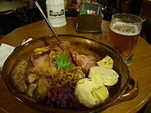 Image 54A "traditional Bohemian platter" at a restaurant in central Prague, consisting of roast duck, roast pork, beer sausage, smoked meat, red and white cabbage, bread, bacon and potato dumplings. (from Czech cuisine)