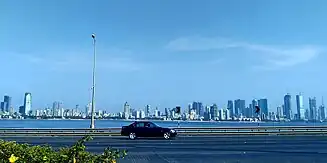 Image 67India's middle-class population of 300 million is growing at an annual rate of 5%. Shown here is an upmarket area in South Mumbai. (from Asian Century)