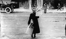 Image 6A newsboy selling the Toronto Telegram in Canada in 1905 (from Newspaper)