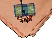 Image 25Wood Badge beads and neckerchief. Wood Badge is the premier Boy Scout adult leader training course. A holder of the Wood Badge is a leader highly trained and dedicated Scout leader.