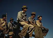 Image 13Sugar cane workers resting at the noon hour, Rio Piedras. Photograph by Jack Delano, a photographer for the Farm Security Administration. Ca. 1941. (from History of Puerto Rico)