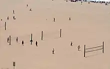 Image 17Public beach volleyball courts in Santa Monica, where the modern two-man version originated. (from Beach volleyball)