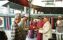 Dinesh Adhikari accepting Madan Puraskar, 2056 B.S. for Atirikta Abhilekh (1999)