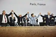 Image 6The Paris Agreement (formerly the Kyoto Protocol) is adopted in 2016. Nearly every country in the United Nations has signed the treaty, which aims to reduce greenhouse gas emissions. (from Environmental science)