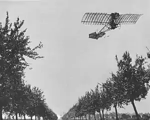 Image 7Alberto Santos-Dumont flying the Demoiselle over Paris (from History of aviation)