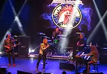 Atomic Rooster performing in 2021, (from left to right) Steve Bolton, Pete French, Paul Everett, Adrian Gautrey and Shug Millidge