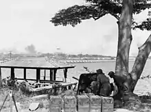 Image 48Australian anti-tank gunners overlooking the Johor Causeway between Singapore and Malaya in February 1942 (from Military history of Australia during World War II)