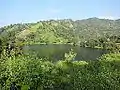 Image 46Bagakain Lake, also called Boga Lake is located in Ruma Upazila in Bandarban. It is a natural sweet and deep water lake situated nearly 1,246 feet (380 m) above sea level. The irregularly shaped lake is bounded on three sides by mountain peaks covered with thick bamboo bushes.Photo Credit: Masum Ibn Musa