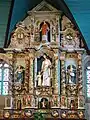 Retable of St Joseph, shown in the centre with the infant Christ.