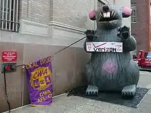 Image 11AFL–CIO unions protest outside Verizon headquarters in Philadelphia using a giant inflatable rat.