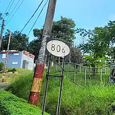 Sign for PR-806 in Corozal, looking north