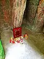 The altar of Ông Tài - Ông Địa in the cave at Kỳ Quang Temple