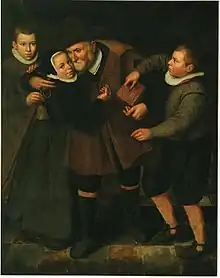 Old man accepting alms