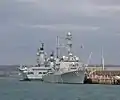 USS Mitscher at Portsmouth in October 2008 berthed with HMS Ark Royal and HMS Illustrious.