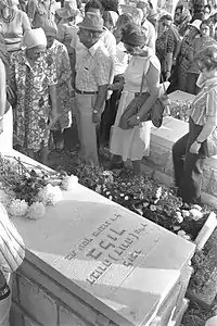 Bloch's coffin with mourners