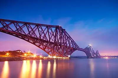 Image 4The Forth Bridge is a cantilever railway bridge over the Firth of Forth. It was opened on 4 March 1890, and spans a total length of 2,528.7 metres (8,296 ft). It is often called the  Forth Rail Bridge or Forth Railway Bridge to distinguish it from the Forth Road Bridge.Photo credit: George Gastin