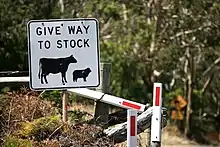 Image 40This Australian road sign uses the less common term "stock" for livestock. (from Livestock)