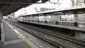 View of the north end of the platforms showing the 2-car-length platform extensions, February 2012