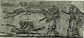 Two Elamite chiefs flayed alive after the battle during the crowning of Khumban-Igash.