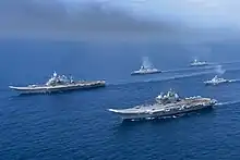 Vikrant  and Vikramaditya with two Kolkata-class destroyer and a Talwar-class frigate.