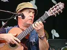Image 15Ilham Madfai, "The Baghdad Beatle". Madfai's synthesis of Western guitar stylings with traditional Iraqi music has made him a popular performer in his native country and throughout the Middle East. (from Music of Iraq)