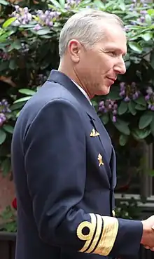 Rear admiral Jonas Haggren with current sleeve insignia for a vice admiral (2003–present)