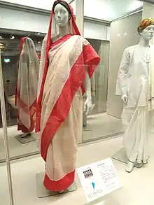 Image 118Red and cream Indian woman's saree, late 1990s (from 1990s in fashion)