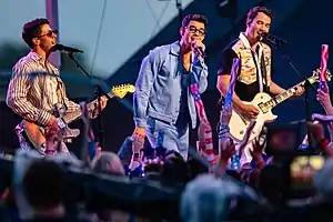 Jonas Brothers performing in 2021;L–R: Nick, Joe, and Kevin