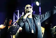 Image 23Kanye West (2007) emerged during the decade as an important hip-hop producer and album artist. (from Album era)