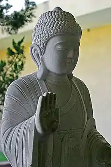 Image 61A stone image of the Buddha (from Culture of Asia)