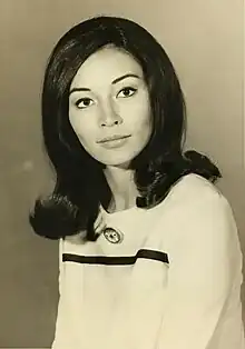 Nancy Hsueh as Mia Elliott in Love is a Many Splendored Thing