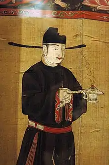 Northern Song Male Buddhist donor with a loose-sleeved dark yuanlingpao