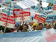 Image 34Union members march in Argentina on Human Rights Day in December 2005.  The signs read "Worker rights are human rights..