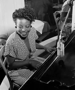 Image 9Mary Lou WilliamsPhotograph credit: William P. Gottlieb; restored by Adam CuerdenMary Lou Williams (May 8, 1910 – May 28, 1981) was an American jazz pianist, arranger, and composer. She wrote hundreds of compositions and arrangements and recorded more than one hundred records. Williams wrote and arranged for Duke Ellington and Benny Goodman, and she was friend, mentor and teacher to numerous other jazz musicians. The second of eleven children, she was born in Atlanta, Georgia, and grew up in the East Liberty neighborhood of Pittsburgh, Pennsylvania. A young musical prodigy, she taught herself to play the piano at the age of three. This photograph of Williams at the piano was taken by William P. Gottlieb around 1946.More selected pictures
