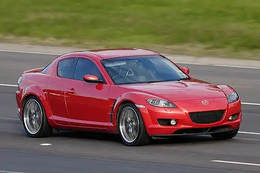 Image 18Mazda RX-8Photo credit: Fir0002The Mazda RX-8 sports car is a front mid-engine, rear-wheel drive four-seat coupé manufactured by Mazda Motor Corporation. It is the successor to the RX-7 and, like its predecessors in the RX range, it is powered by a rotary engine. The RX-8 began North American sales in the 2004 model year.More selected pictures