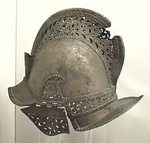 An ornate burgonet with cheek-guards from the Philippine Moros (c. 18th/19th century), Museo de América.