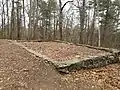 Foundation of James DeNormandie's cabin from the mid-20th century on the summit of Mount Misery
