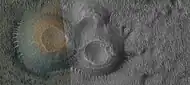 Close view of mud volcanoes, as seen by HiRISE   Low area around the volcanoes contains transverse aeolian ridges (TAR's).  Only part of picture is in color because HiRISE only takes a color strip in middle of image.