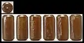 A cylinder seal in the Walters Art Museum using the KÚR sign.