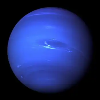Image 12NeptunePhotograph credit: NASA / JPLNeptune is the eighth and farthest known planet from the Sun in the Solar System. In the Solar System, it is the fourth-largest planet by diameter, the third-most-massive planet and the densest giant planet. Neptune is 17 times the mass of Earth, slightly more massive than its near-twin Uranus. Neptune is denser and physically smaller than Uranus because its greater mass causes more gravitational compression of its atmosphere. Neptune orbits the Sun once every 164.8 years at an average distance of 30.1 au (4.5 billion km; 2.8 billion mi). It is named after the Roman god of the sea and has the astronomical symbol ♆, a stylised version of the god Neptune's trident.This picture of Neptune was taken by NASA's Voyager 2 spacecraft in 1989, at a range of 4.4 million miles (7.1 million kilometres) from the planet, approximately four days before closest approach. The photograph shows the Great Dark Spot, a storm about the size of Earth, in the centre, while the fast-moving bright feature nicknamed the "Scooter" and the Small Dark Spot can be seen on the western limb. These clouds were seen to persist for as long as the spacecraft's cameras could resolve them.More selected pictures