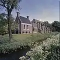View of facade and right side wall, farm at Boksum, Netherlands