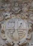 Coat of arms of Jan Daniłowicz. Sas, Topór, Herburt and Korczak (from his mother Katarzyna Tarło h. Topór, and his grandmothers Katarzyna Odnowska h. Herburt, and Regina Malczycka h. Korczak) coats of arms in Olesko castle main gate.