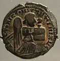 Coin of Kara Arslan, no date, mint of Amid, with Roman winged victory holding a book. British Museum.