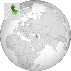 Territory controlled by Artsakh after the Second Nagorno-Karabakh War shown in dark green; territory claimed but not controlled shown inlight green; Lachin corridor shown in white