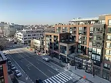 Retail and new apartment buildings along 14th Street, 2019